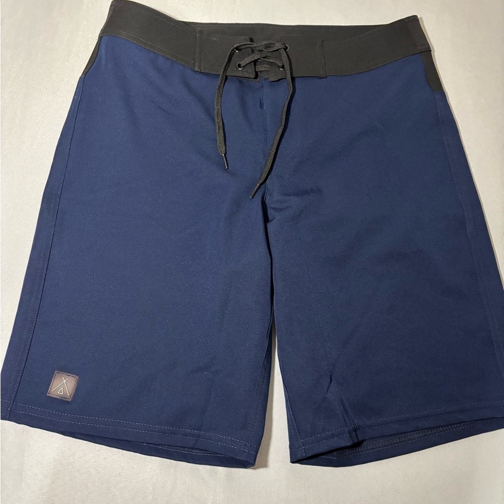 Mens size medium tribe Kelley swim shorts, #A996